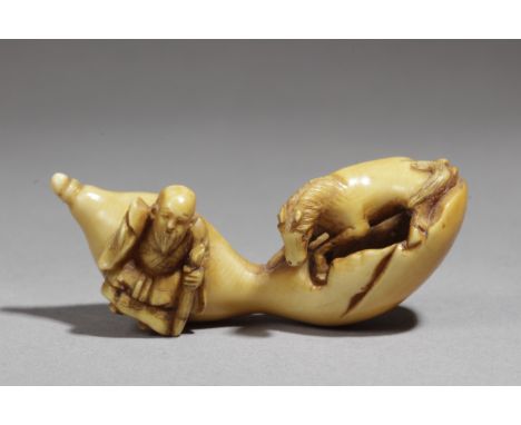 A 19th century Japanese netsuke. Signed Tomochika. In carved ivory portraying an elderman resting on a huge double guard from