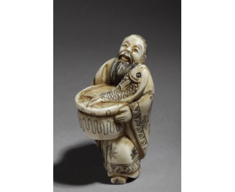 A 19th century Japanese netsuke from Meiji period. Signed on the base. In carved elephant ivory portraying a fisherman carryi