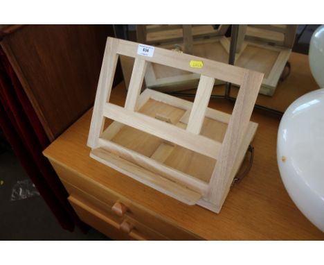 A small folding artists easel
