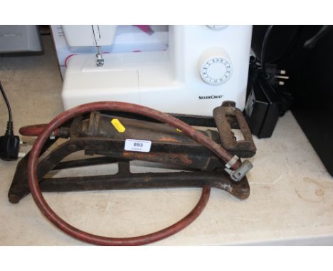 A brass Dunlop foot pump