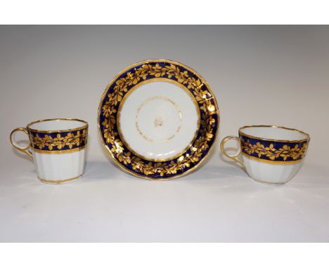 A Worcester blue and gilt panelled trio, saucer 14.5 cm diameter, Circa 1810
