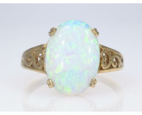 9ct gold opal set ring with open scroll shoulders hallmarked   Condition Report  size R-SApprox 2.2gm Click here for further 