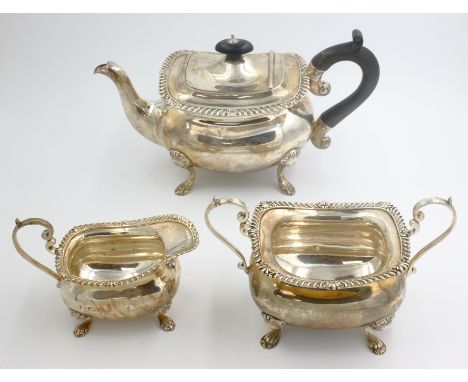 Silver three piece tea set by Walker & Hall Birmingham, teapot 1901, sugar and milk 1909 approx 31oz gross   Condition Report