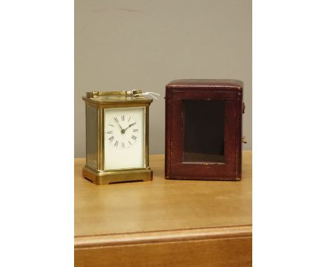 20th century brass and bevel glazed carriage clock, single train movement with platform escapement, with hinged leather case,