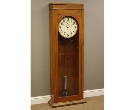 20th century IBM Model 13-7 Electric slave clock, No.15255, circular white Arabic dial with subsidiary seconds, in oak case w