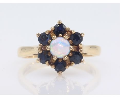 Opal and sapphire gold cluster ring hallmarked 9ct    Condition Report  Approx 3.4gm size N-O Click here for further images, 