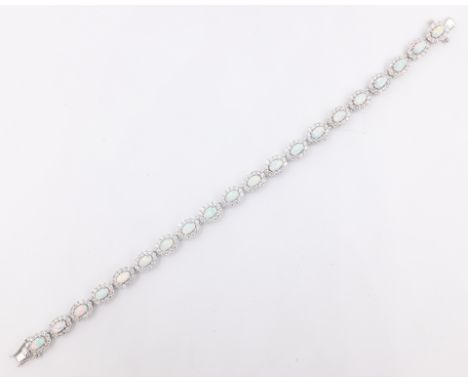 Opal and cubic zirconia silver bracelet stamped 925   Condition Report   Click here for further images, condition, auction ti