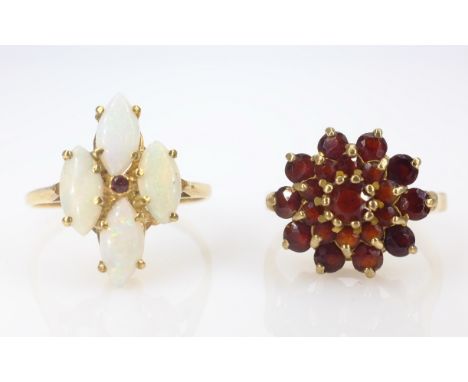 Opal and ruby ring stamped 9ct and a garnet cluster ring hallmarked 9ct    Condition Report  Garnet ring approx 3gm size H Op