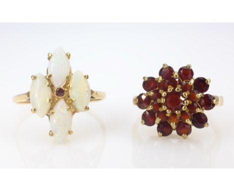 Opal and ruby ring stamped 9ct and a garnet cluster ring hallmarked 9ct    Condition Report  Garnet ring approx 3gm size H Op