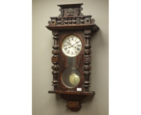 20th century Vienna type wall clock with glazed door, and shaed cresting, silvered Roman dial with twin train movement striki