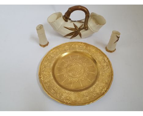 A collection of Royal Worcester pieces to include, a gold floral patterned plate together with three vases with vine and leaf