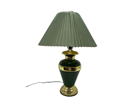 Table lamp of baluster form decorated in mottled green with gilt mounts and banding, with pleated green shade, approx H72cm i
