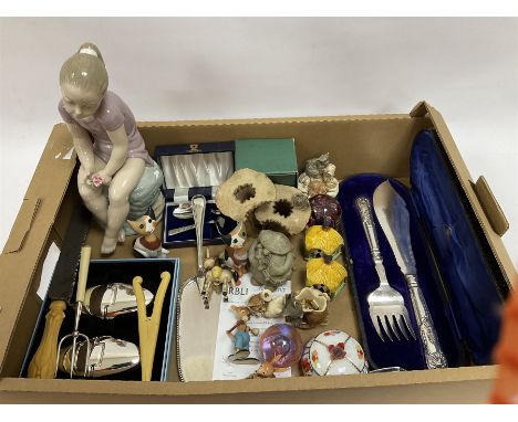 Large Nao figure modelled as a young girl seated upon a rock holding a rose, H30cm, Cased pair of Wedgwood silver-plate book 