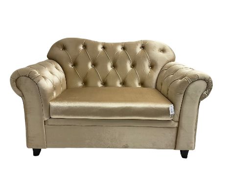 Chesterfield shaped snuggler sofa, upholstered in buttoned champagne fabric, with scatter cushionsDimensions: Height:&nbsp;89