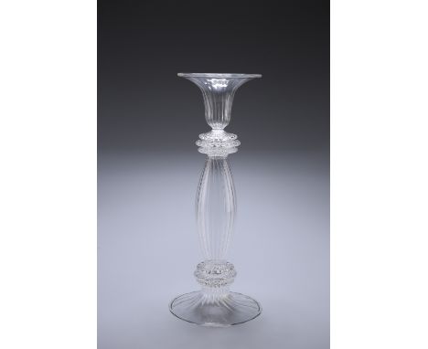 A RARE SALVIATI GLASS CANDLESTICK, the stem a tapering ribbed ovoid with three ringed collars top and bottom, the bell-shaped