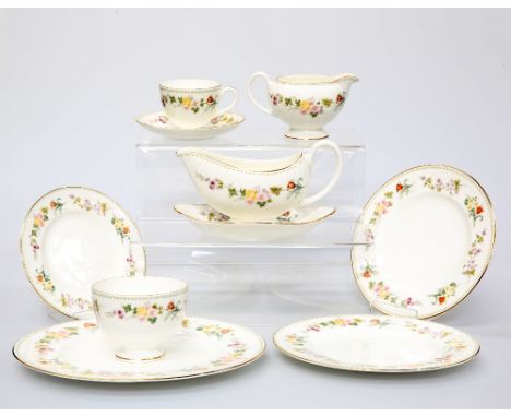 A WEDGWOOD "MIRABELLE" PATTERN DINNER AND TEA SERVICE, comprising eight dinner plates, six luncheon plates, six side plates, 