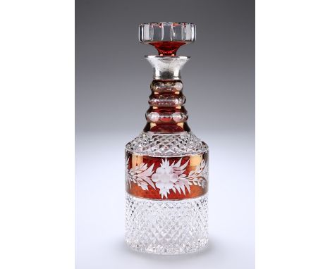 A SILVER-COLLARED RUBY FLASH GLASS DECANTER AND STOPPER, hallmarked C.J. Vander Ltd, London 1971, the ruby glass cut-through 
