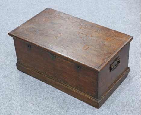 AN 18TH CENTURY OAK TRUNK, UNUSUALLY FITTED WITH THREE LOCKS, with carrying handles.&nbsp;30.5cm high, 67.5cm wide, 38cm deep