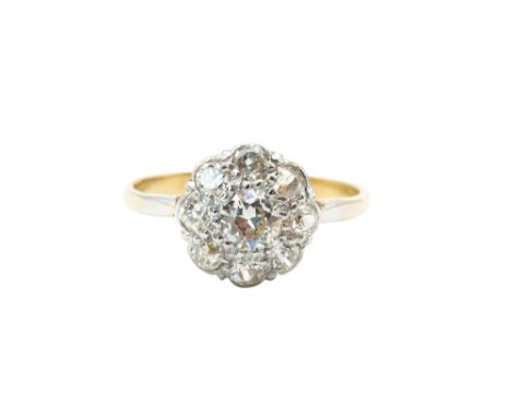 A DIAMOND CLUSTER RINGThe floraform cluster, set throughout with brilliant-cut diamonds, to a polished hoop, diamonds approx.