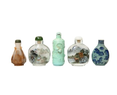 A GROUP OF FIVE CHINESE SNUFF BOTTLES, including two glass. Tallest 8.5cmCeramic bottle with blue decoration is lacking top o