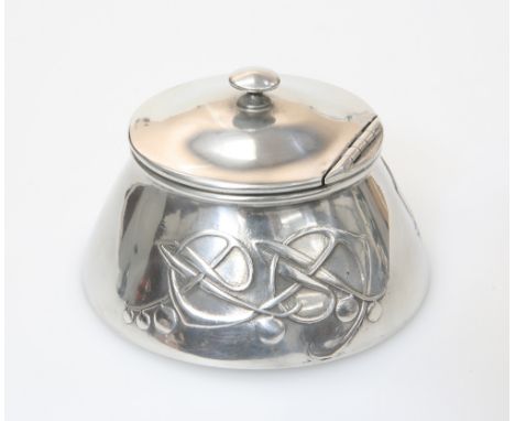 ARCHIBALD KNOX (1864-1933) A LIBERTY &amp; CO TUDRIC PEWTER INKWELL, no. 0653,&nbsp;the domed hinged lid with turned knop, ab