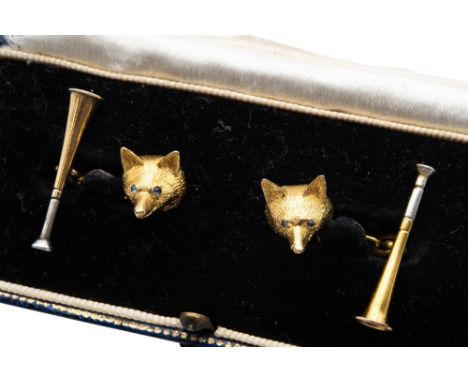 A PAIR OF EARLY 20TH CENTURY NOVELTY HUNTING CUFFLINKSDouble-sided, the realistically modeled fox mask with cabochon sapphire