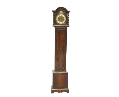 AN EARLY 20TH CENTURY OAK THREE-TRAIN GRANDMOTHER CLOCK, the arched hood with barleytwist columns, the 7 1/2-inch break-arch 