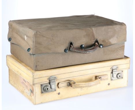TWO PIECES OF VINTAGE LUGGAGE, the first green leather, fitted for dressing articles; the second vellum, each initialled. (2)