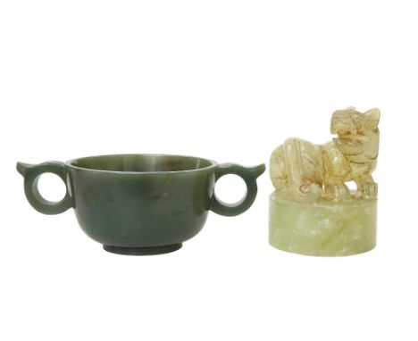 A CHINESE JADE CENSER, with twin loop handles, 12.7cm across handles; together with A CHINESE JADE TABLE SEAL, 7.2cm. (2)Cens