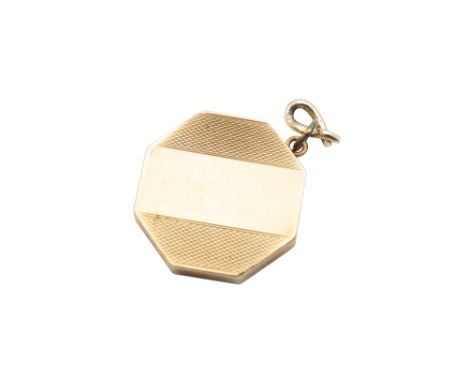 A 9 CARAT GOLD LOCKET PENDANTOf octagonal outline, with engine-turned decoration, maker's mark 'FM', UK hallmark, diameter 1.