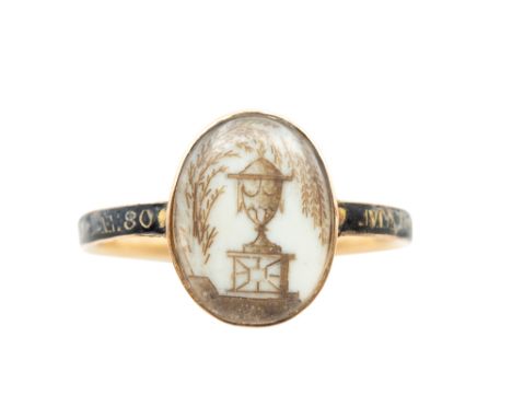 A HAIRWORK AND ENAMEL MOURNING RING, CIRCA 1780 The glazed oval compartment containing a hairwork depiction of an urn beneath