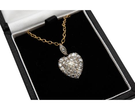 A LATE 19TH CENTURY DIAMOND LOCKET PENDANT The heart-shaped pendant, pavé-set with old brilliant-cut diamonds, with glazed co