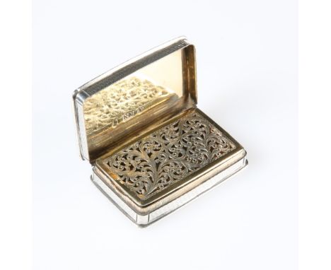 A WILLIAM IV SILVER VINAIGRETTE, NATHANIEL MILLS, BIRMINGHAM 1832, the rectangular engine-turned case opening to reveal pierc
