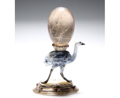 A CONTINENTAL SILVER, ENAMEL AND ROCK CRYSTAL DESK ORNAMENT, CIRCA 1900, modelled as an emu surmounted by an egg. 12cm high