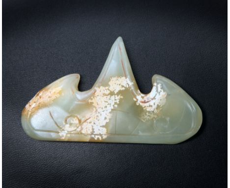 A CHINESE JADE BRUSH REST, 19TH CENTURY, carved as a three-peak mountain. 6.3cm by 10.1cm, approx. 112 gramsIn good condition