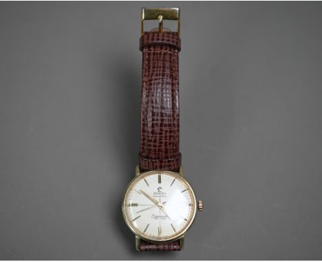 A gold plated Omega automatic Seamaster De Ville wrist watch, the champagne dial with gilt batons and date aperture, 34 mm di