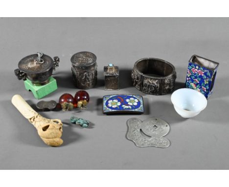 A mixed lot of Asian collectibles including a 19th century South Indian silver swami ware bracelet, the six hinged articulate