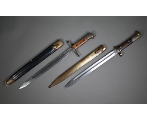 An E26 bayonet, the sngle fuller blade with wood grip, in steel scabbard to/w another bayonet and scabbard (2)  