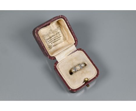 An antique pearl and diamond ring, the three milgrain set pearls with two rose-cut diamonds between each, 18ct yellow and whi