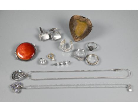 A quantity of white metal jewellery items including red Ruskin-type ceramic disc brooch, cz set pendants, cufflinks, rings, a