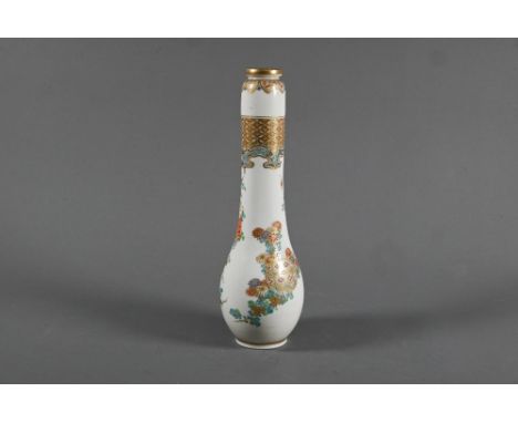 A Japanese Kyo Satsuma Awata ware bottle vase by Taizan Yohei (1864-1912) gilded and painted in polychrome enamels with flora