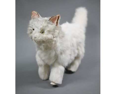 A Roullet et Decamp white fur automaton cat, 45 cm long x 26 cm high, runs along, waving tail and 'miaowing'  Working order, 