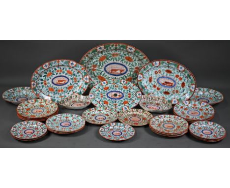 A Regency Minton part dinner service, painted with the 'Crazy Cow' pattern, no. 106, comprising seven 24 cm plates, six 22 cm