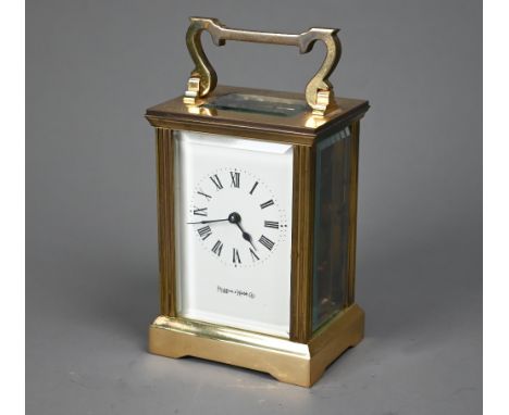 A Mappin &amp; Webb retailed brass carriage clock c/w key  