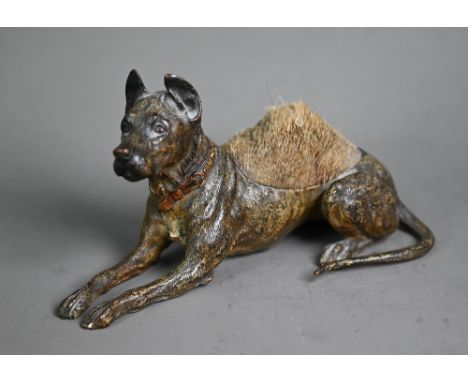 An Austrian cold painted bronze pen wipe, modelled as a recumbent Great Dane, with hogs hair bristle back, 17.5 cm x 9 cm h  