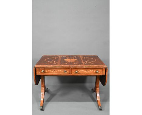 A Sheraton inlaid satinwood sofa table, the drop end top with ribbon bow design over two frieze drawers opposing dummy drawer