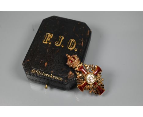 An 18ct yellow gold and enamel Imperial Austrian Order of Franz Joseph, officer's breast cross by Vinc. Mayers', Sohne, Vienn