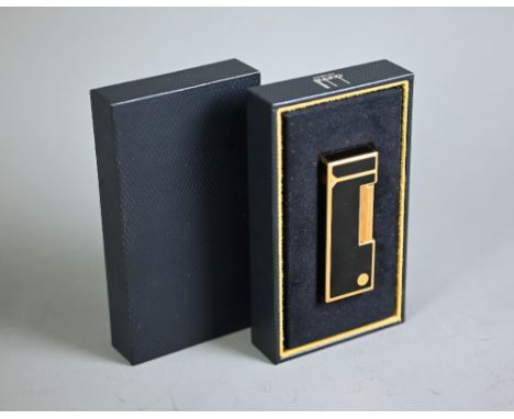 A Dunhill black enamel and gilt metal Rollagas cigarette lighter, in box, unused  top of box missing