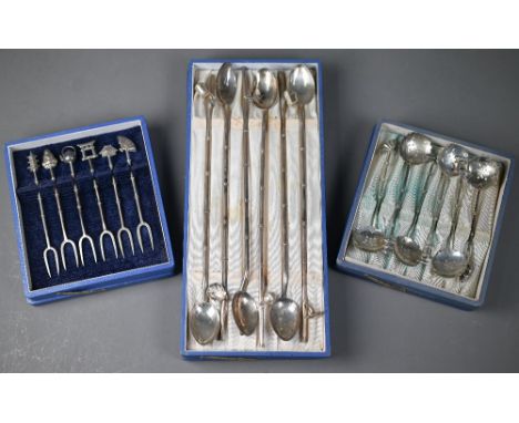 A cased set of six vintage Japanese Sterling 950 cocktail spoons , the 23cm hollow drinking-straw stems hung with miniature o