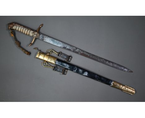 An 1856 pattern midshipman's dirk and scabbard, the unbranded blade etched with a crowned GRV cypher and crowned fouled ancho